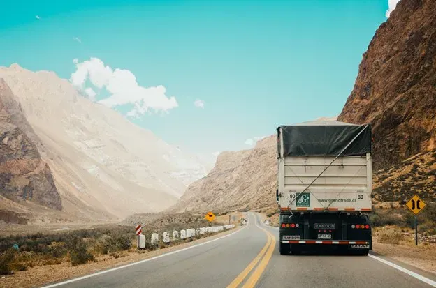 Freight truck travelling along a mountain highway